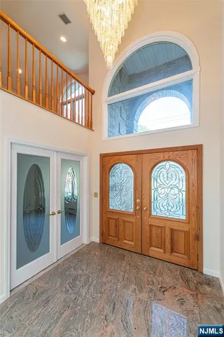 a view of front door with stairs