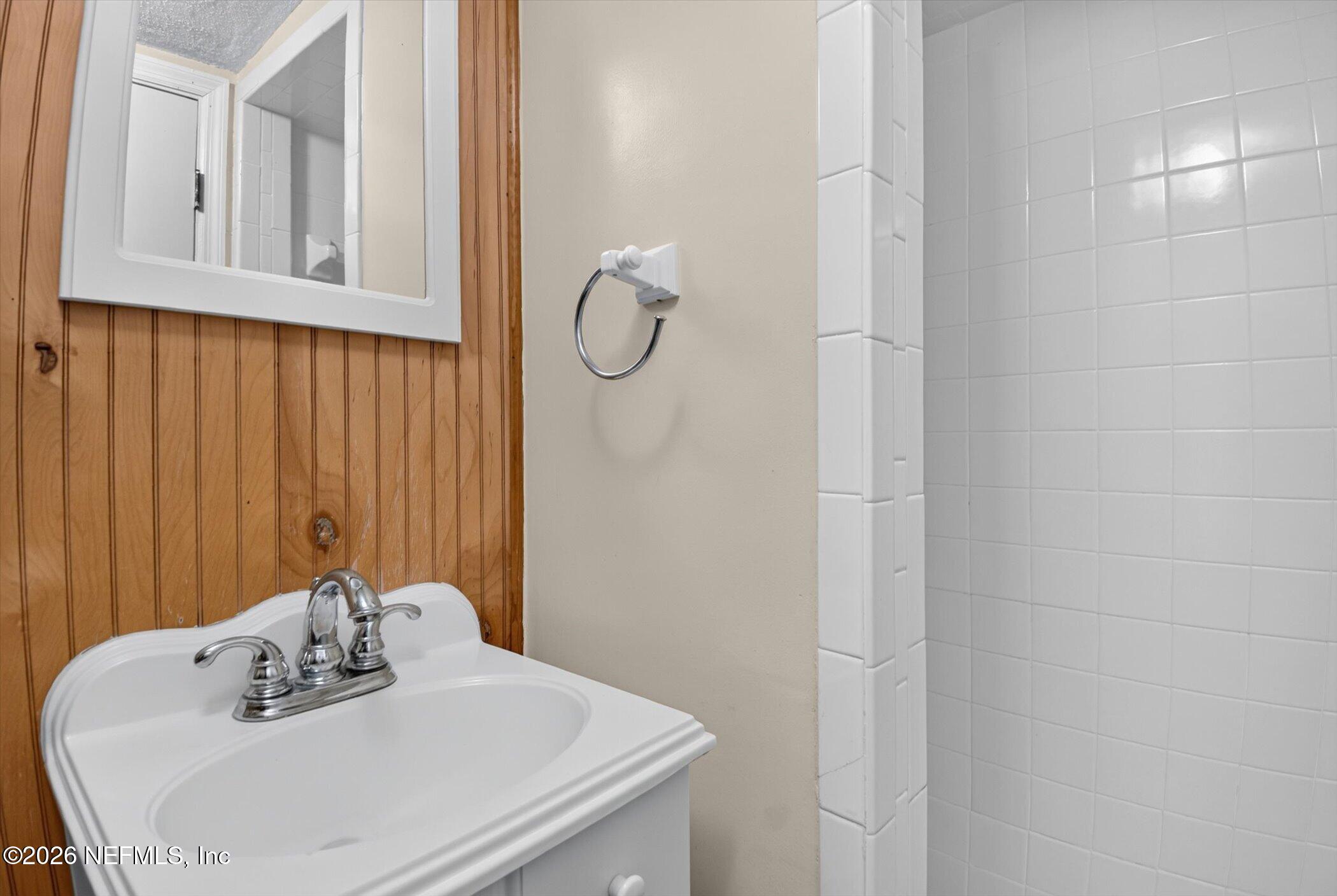 2705 Navajo Road Orange Park, FL 32073 - Photo 10 of 58 a bathroom with a sink and vanity