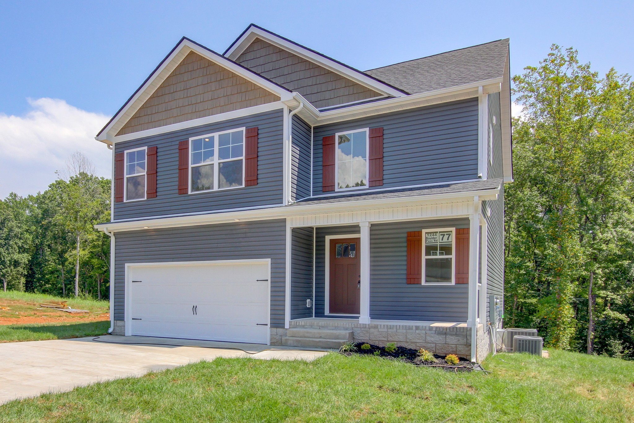 1244 Boulder Pass Road Clarksville, TN 37040 - Photo 2 of 31 a view of an house with backyard space and garden