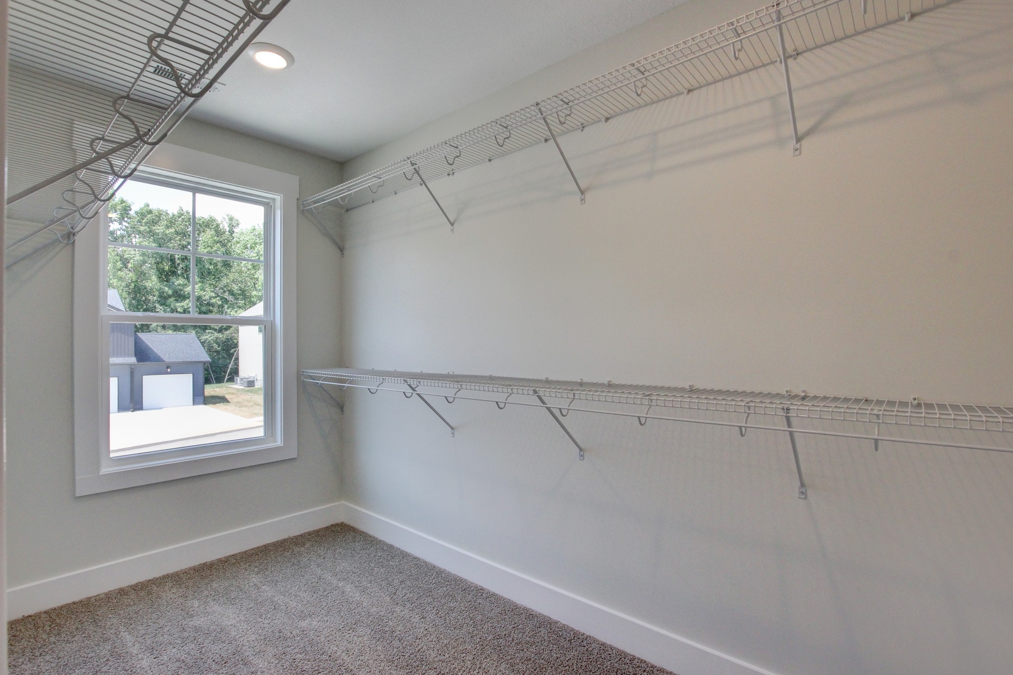 1244 Boulder Pass Road Clarksville, TN 37040 - Photo 21 of 31 a view of a room with racks on the wall