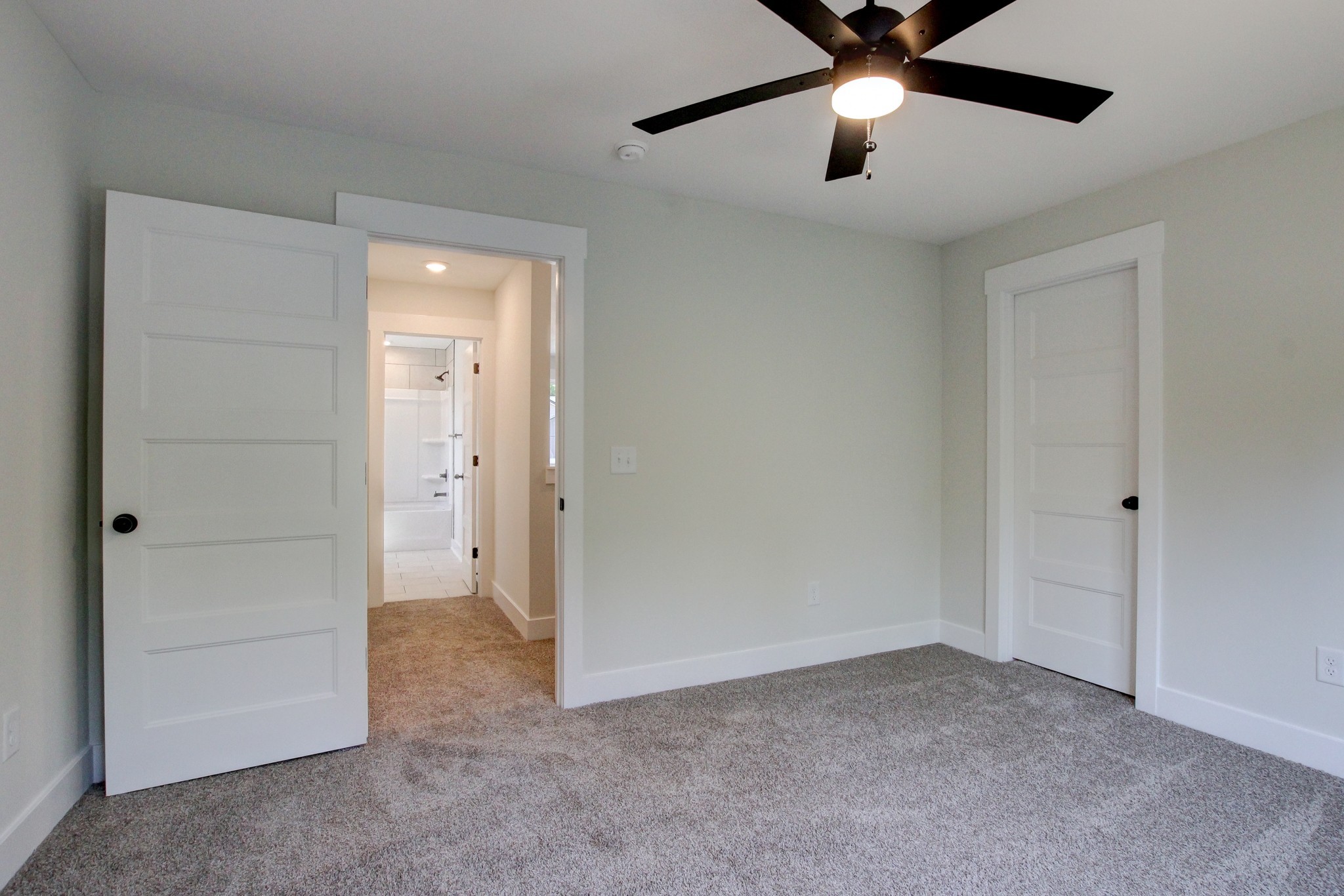 1244 Boulder Pass Road Clarksville, TN 37040 - Photo 27 of 31 an empty room with closet and a chandelier fan