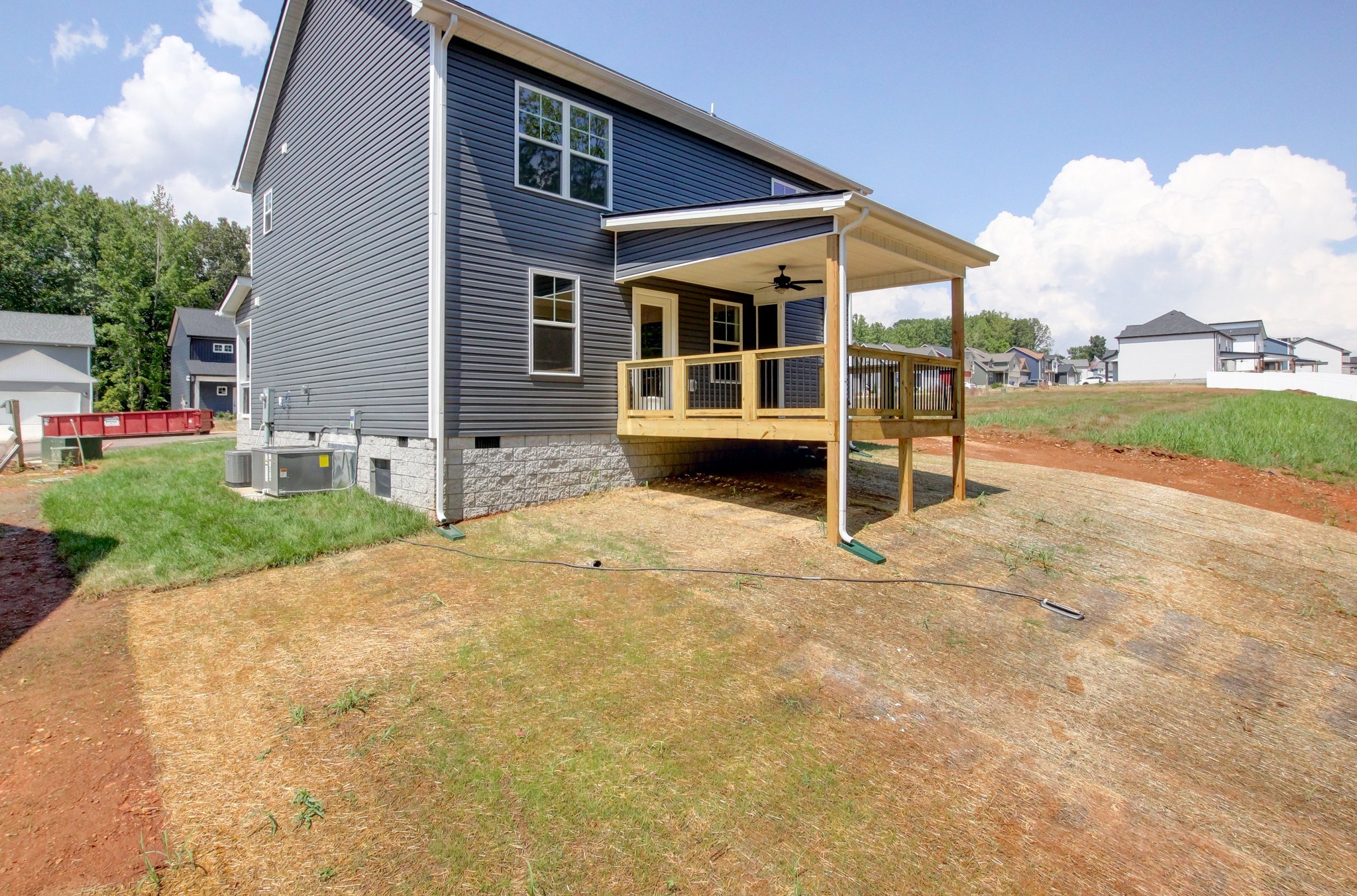 1244 Boulder Pass Road Clarksville, TN 37040 - Photo 31 of 31 a view of a house with backyard and porch