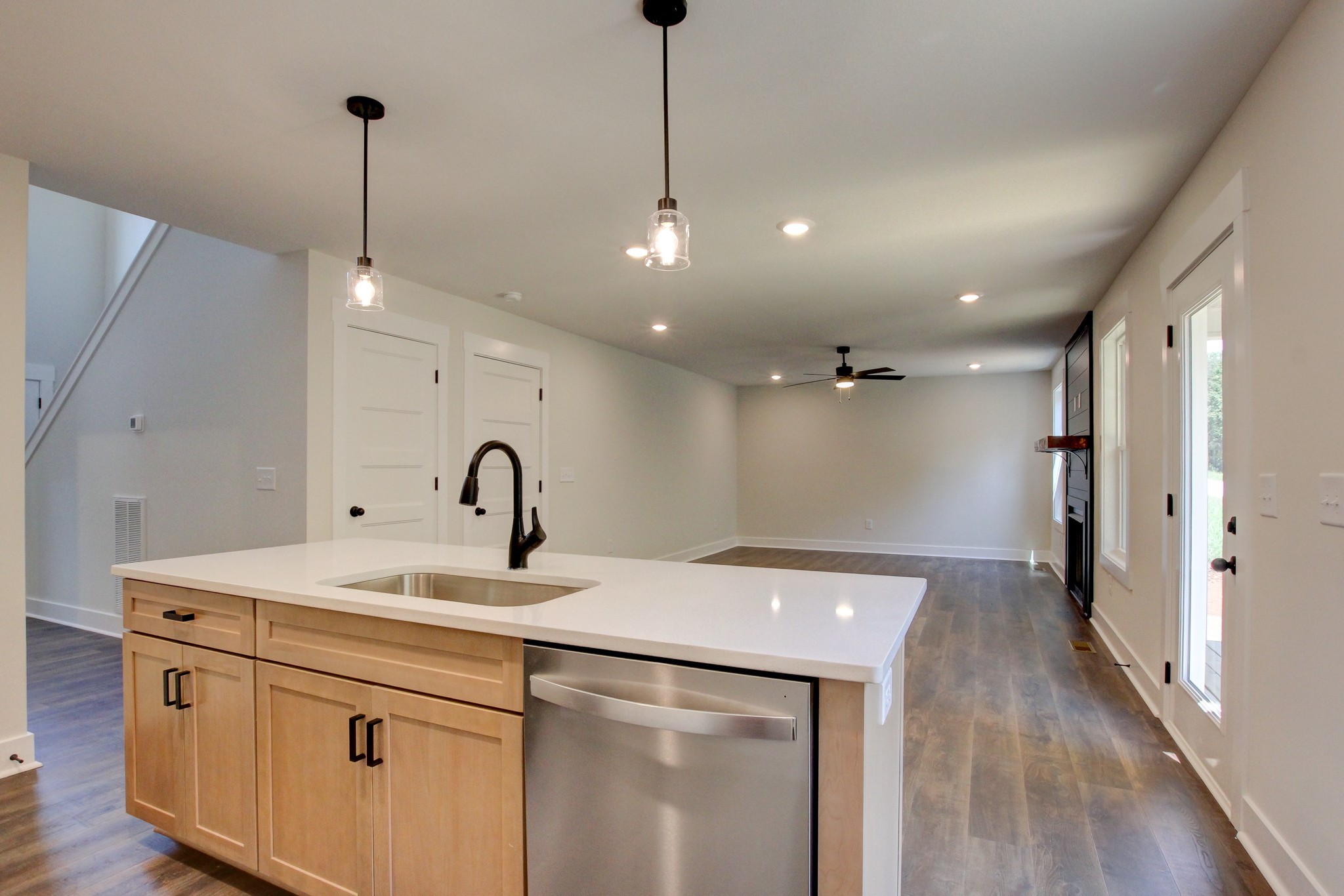 1244 Boulder Pass Road Clarksville, TN 37040 - Photo 10 of 31 a kitchen with a sink and chandelier