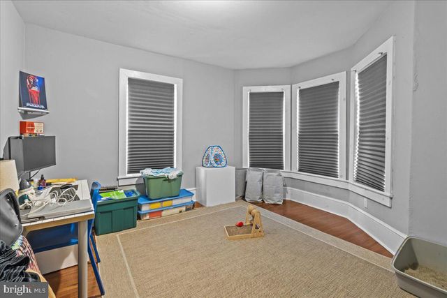 a kitchen with stainless steel appliances a stove and cabinets