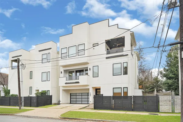 a kitchen with lots of counter top space and living room