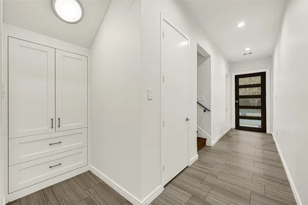 a living room with fireplace furniture and a flat screen tv