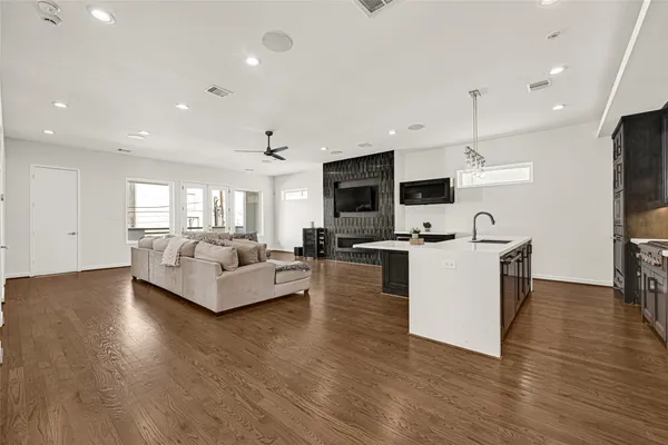 a bedroom with a large bed and a flat screen tv