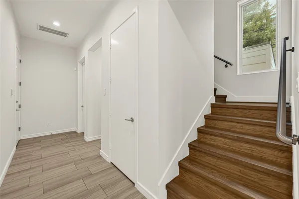 a living room with fireplace furniture and a flat screen tv