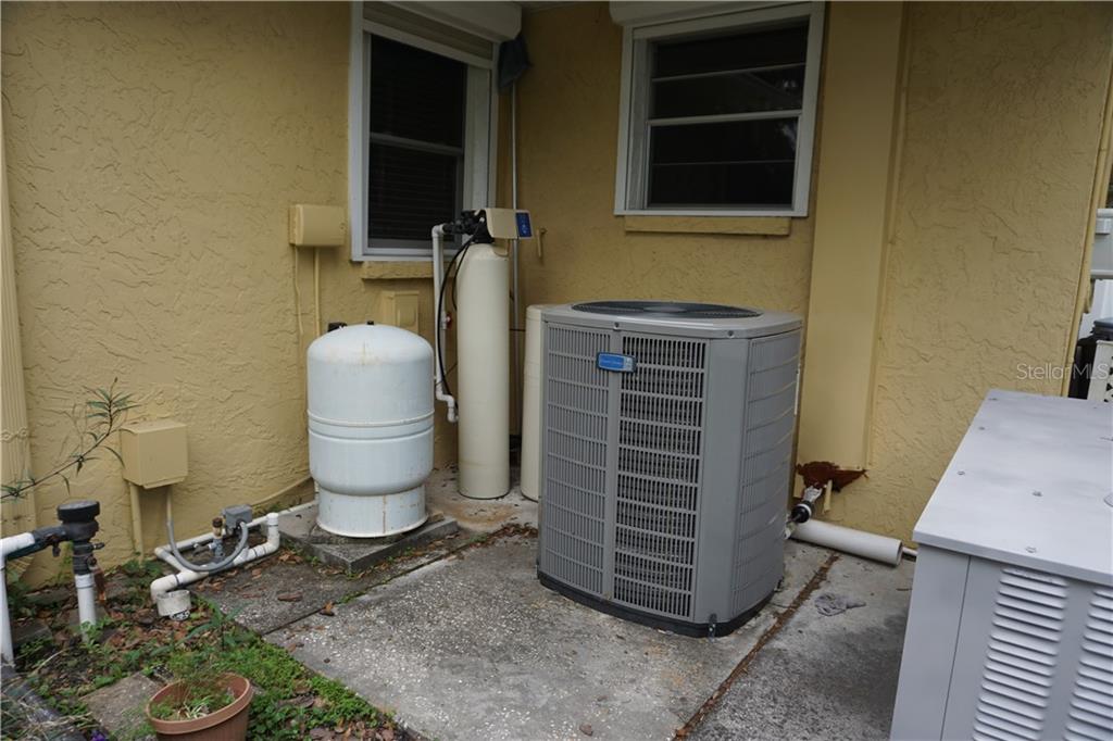 1823 South Valrico Road Valrico, FL 33596 - Photo 37 of 49 Culligan Man water softner! Updated AC system too!