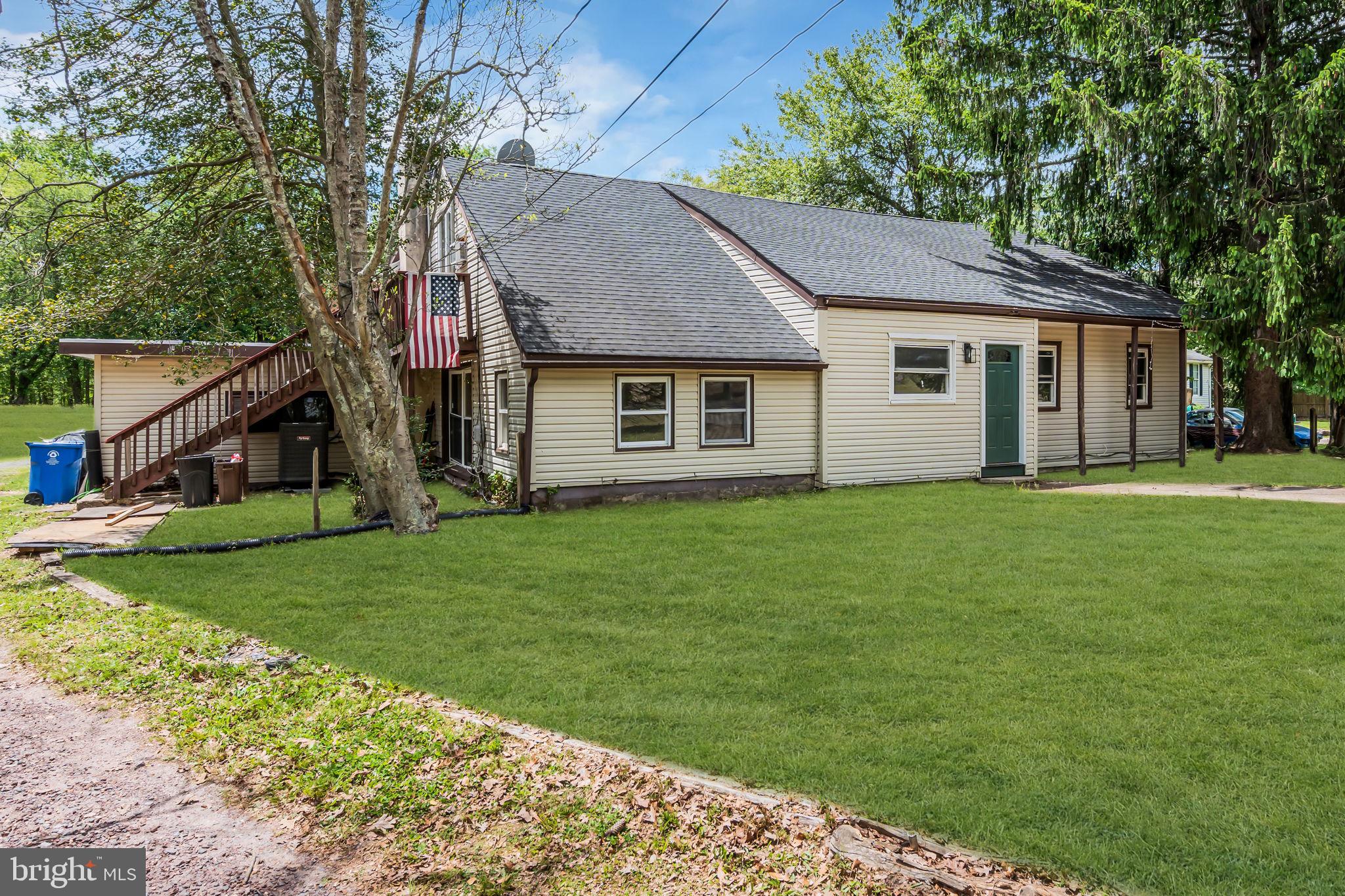 2438 Range Road Browns Mills, NJ 08015 - Photo 2 of 61 a house that is sitting in the grass