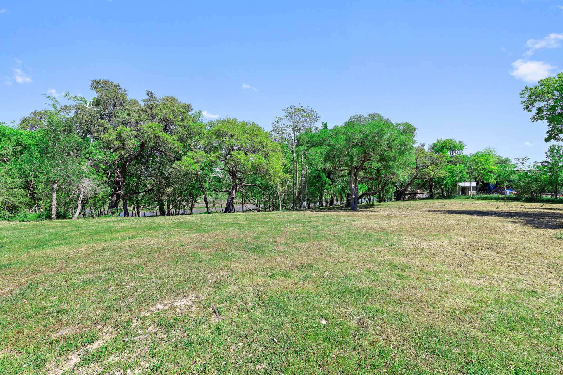 571 Ranch Road 1 Stonewall, TX 78671 - Photo 11 of 21 View of green lawn