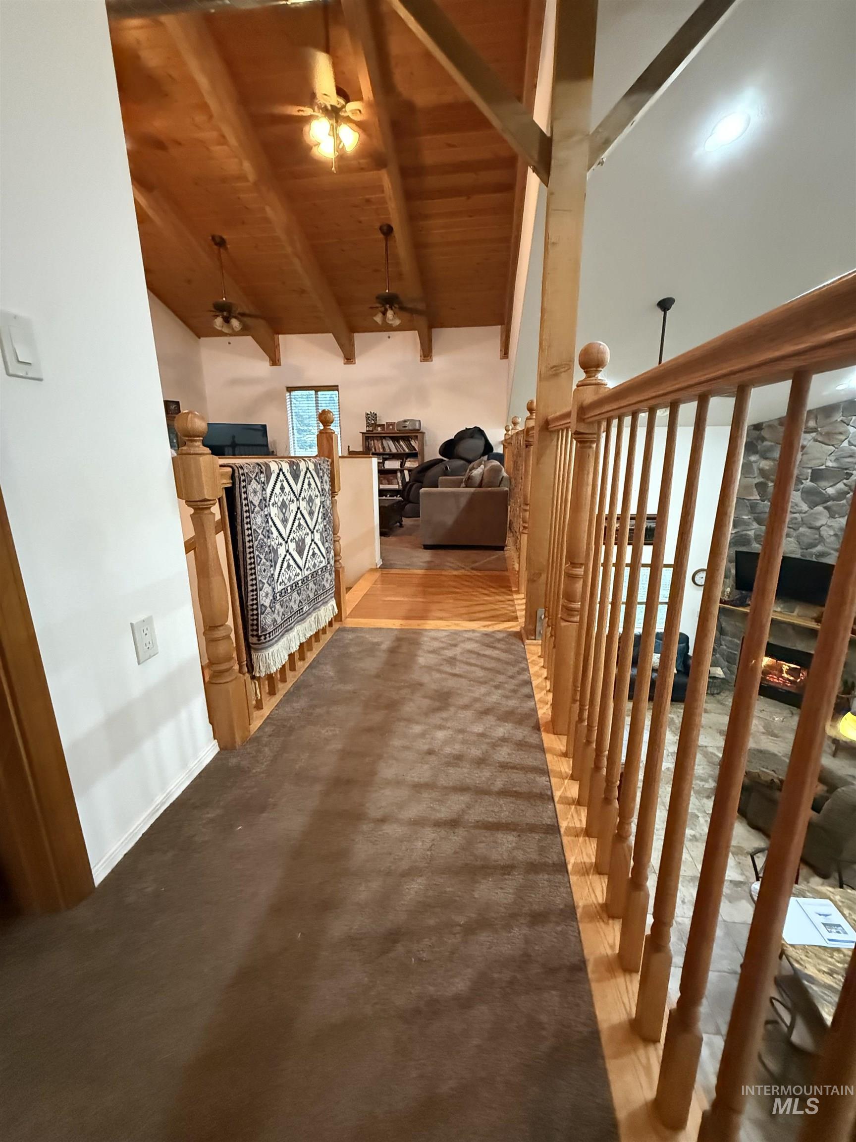 1653 Kidder Ridge Road Kamiah, ID 83536 - Photo 20 of 47 Hallway featuring wood ceiling and light wood-style floors