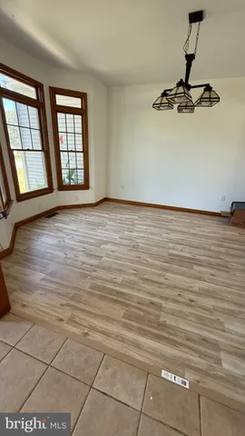 a bedroom with a bed and pillows