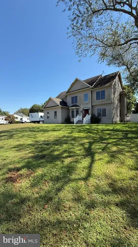 a view of a house with a big yard