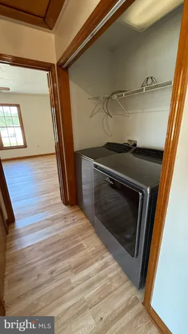 a room with toys and a wooden floor