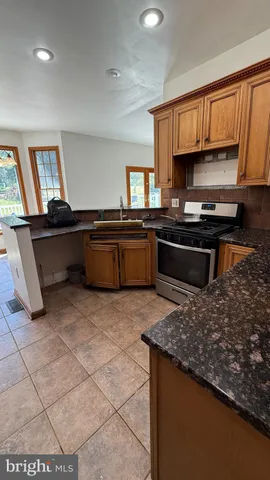 a view of gallery with wooden floor