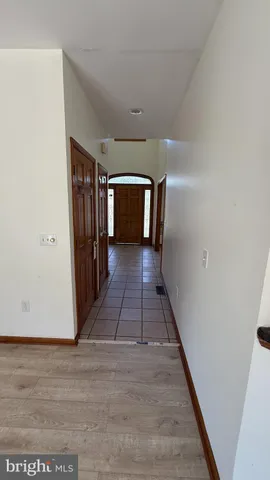 a kitchen with lots of counter top space and a window