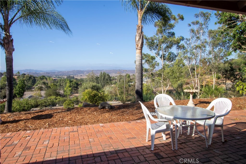 17595 Rancho De La Angel Road Ramona, CA 92065 - Photo 23 of 63 a view of a chairs and table in the patio