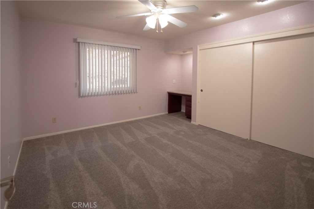 17595 Rancho De La Angel Road Ramona, CA 92065 - Photo 41 of 63 an empty room with fan and windows