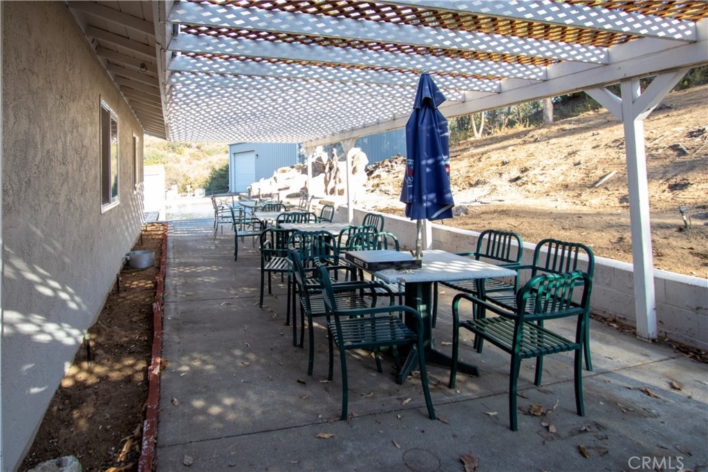 17595 Rancho De La Angel Road Ramona, CA 92065 - Photo 46 of 63 a view of a dining room with furniture window and outside view