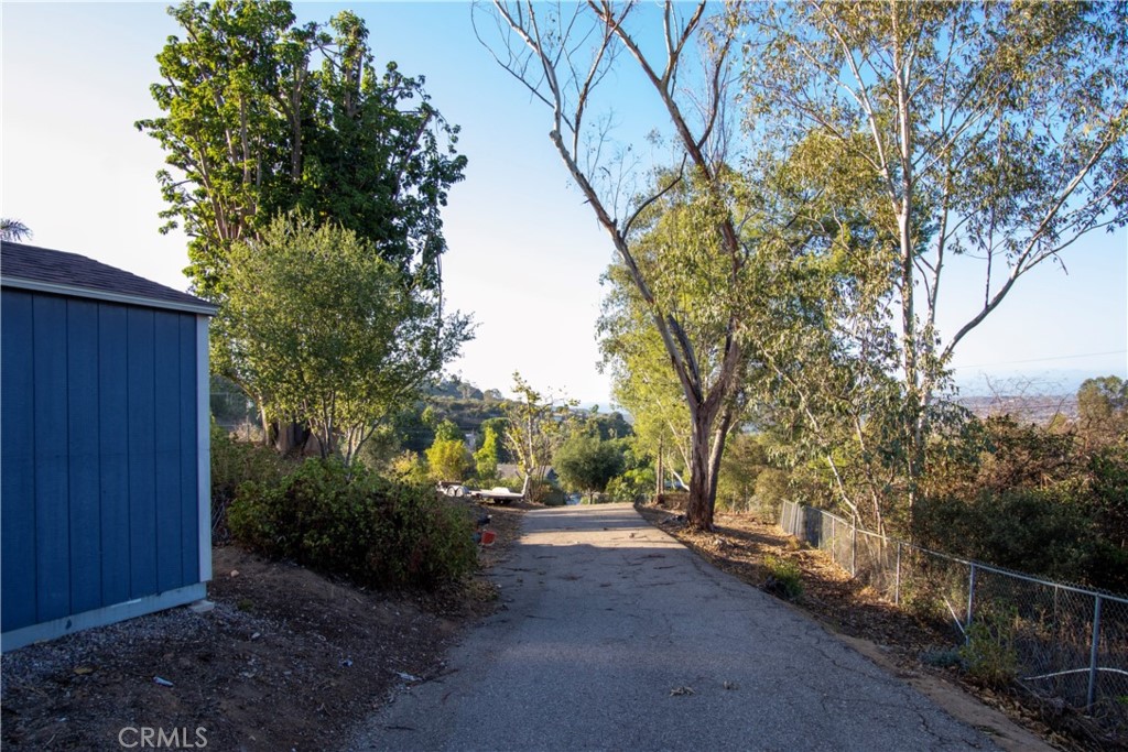 17595 Rancho De La Angel Road Ramona, CA 92065 - Photo 58 of 63 a view of a street with some trees