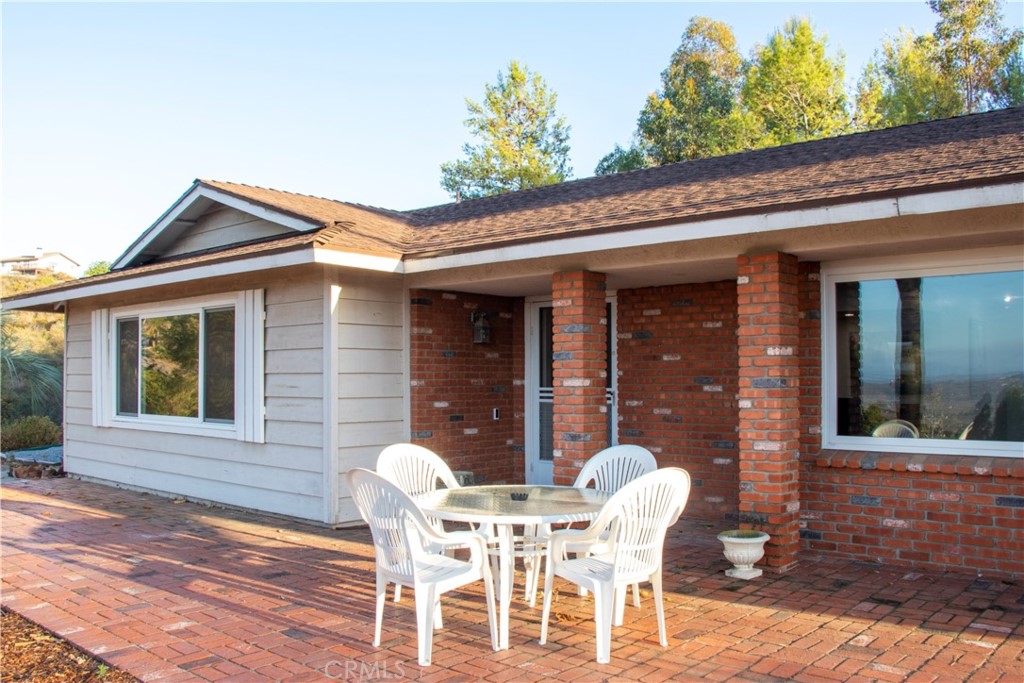 17595 Rancho De La Angel Road Ramona, CA 92065 - Photo 7 of 63 a view of a chair and table in the patio