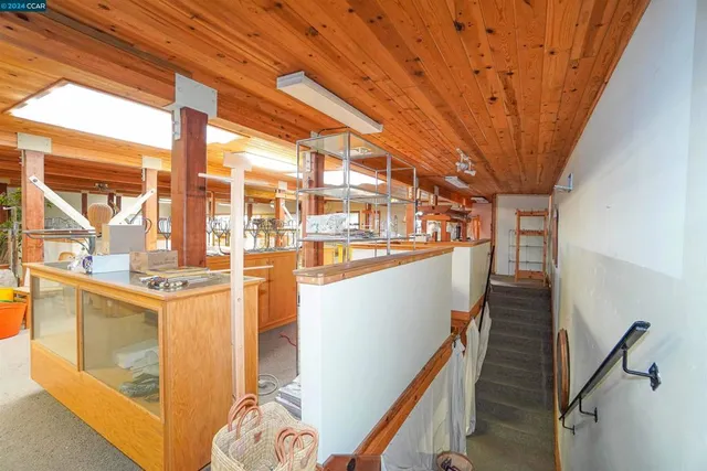 a bathroom with a toilet a sink and a shower