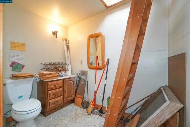 a view of a chairs and table in a patio