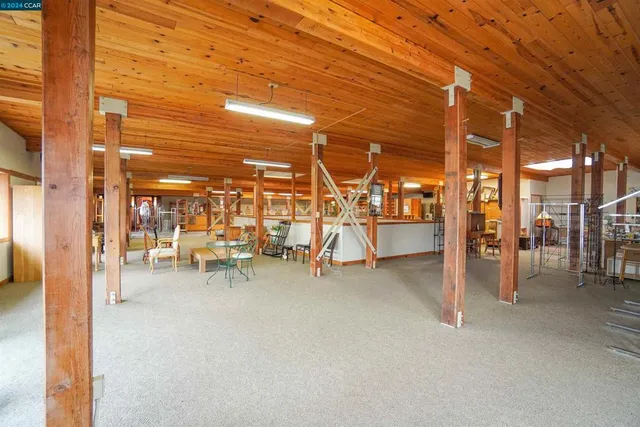 a view of an empty room with stairs