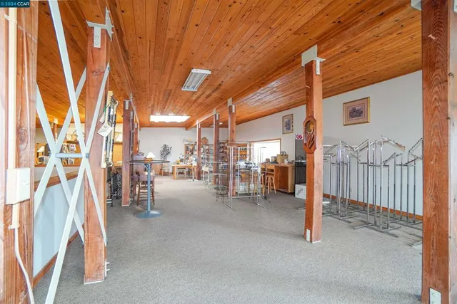a view of swimming pool with outdoor seating