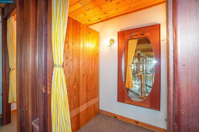 a view of gym equipment with outdoor seating