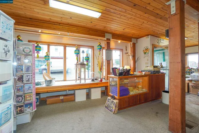 a room with pool table and furniture