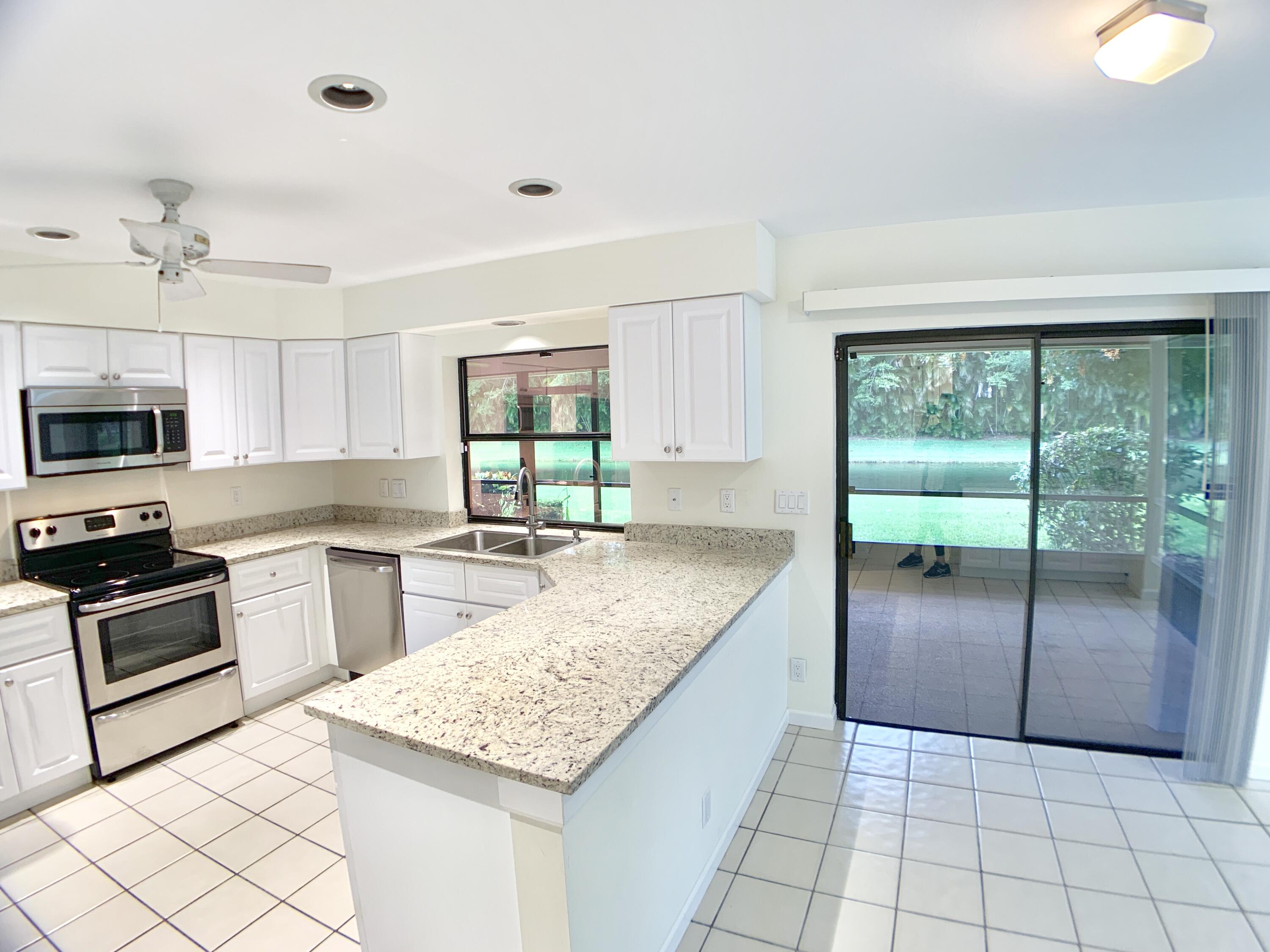 1242 Raintree Lane Wellington, FL 33414 - Photo 14 of 36 Kitchen/Breakfast