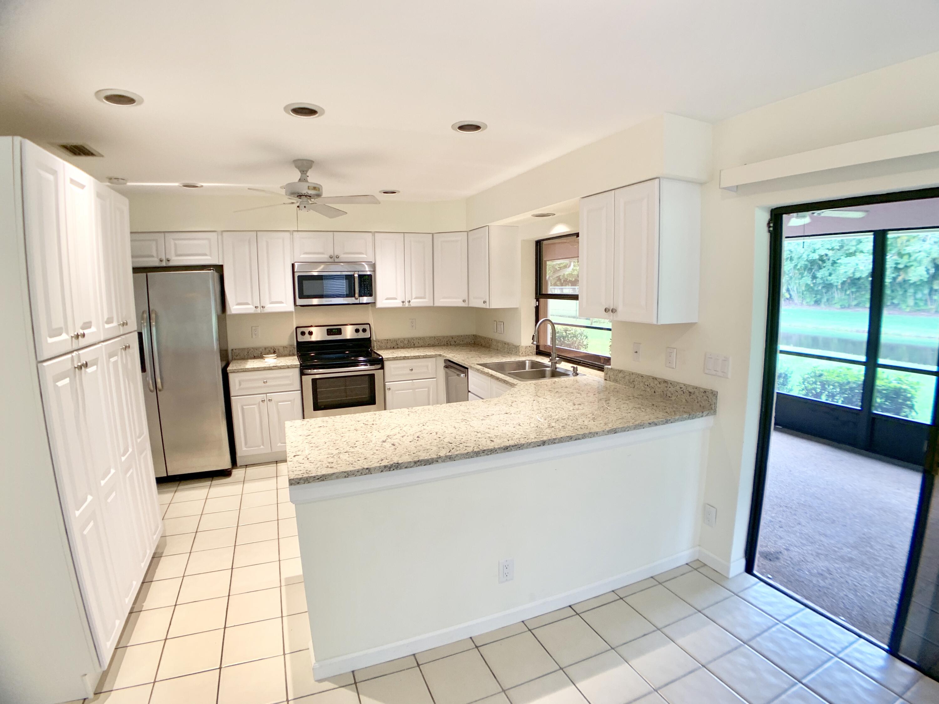 1242 Raintree Lane Wellington, FL 33414 - Photo 15 of 36 Kitchen/Breakfast