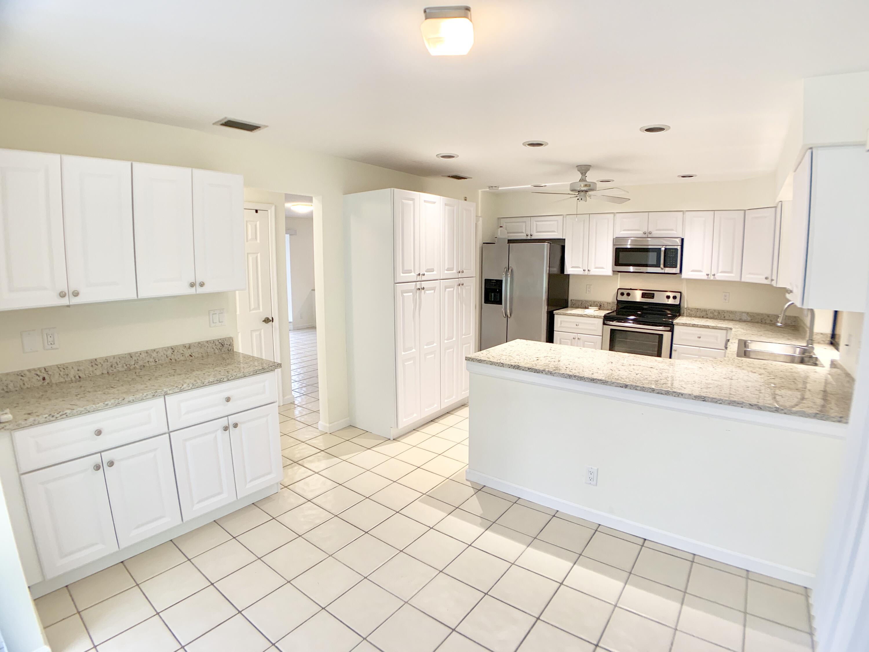 1242 Raintree Lane Wellington, FL 33414 - Photo 16 of 36 Kitchen/Breakfast