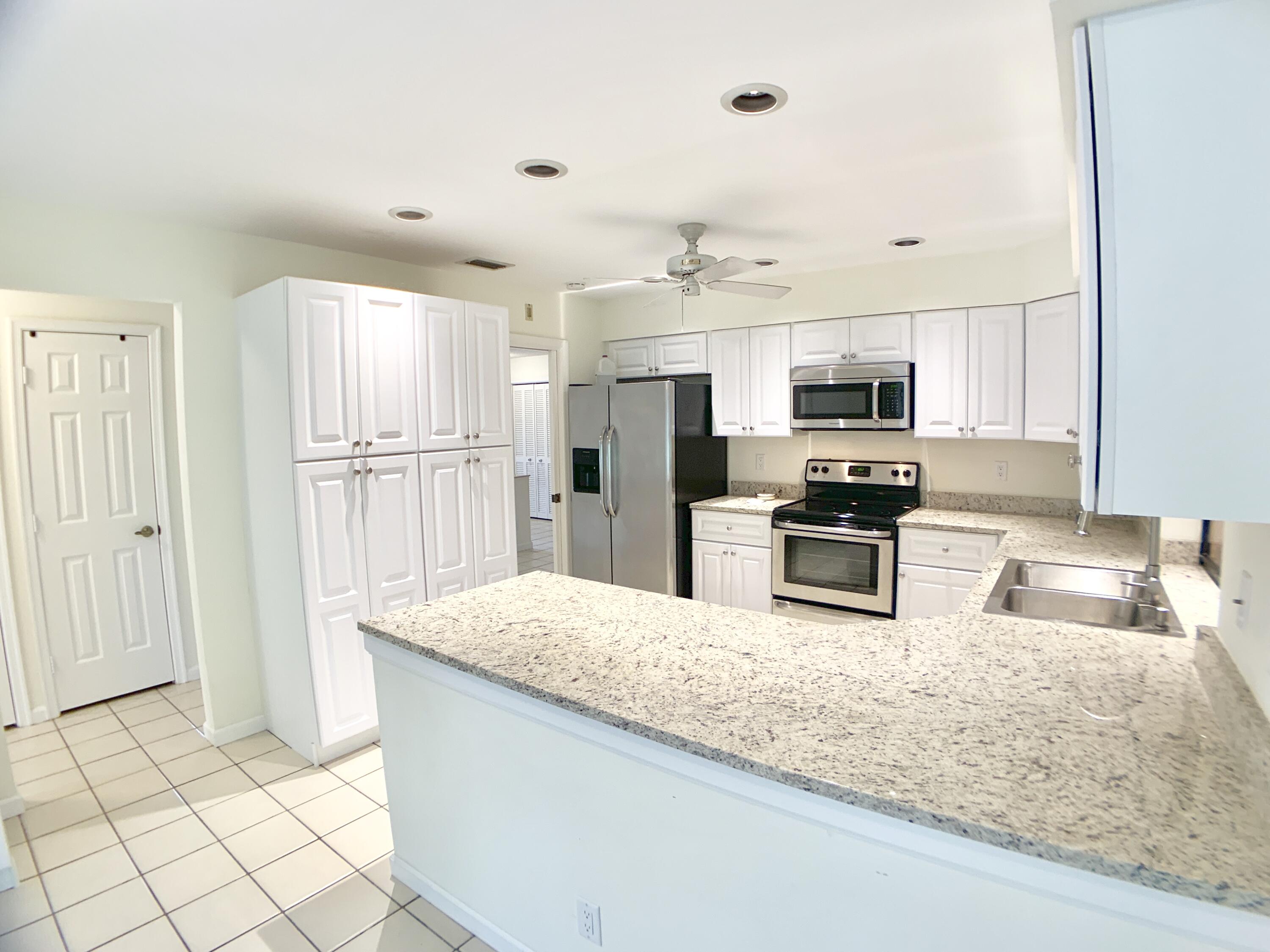 1242 Raintree Lane Wellington, FL 33414 - Photo 17 of 36 Kitchen