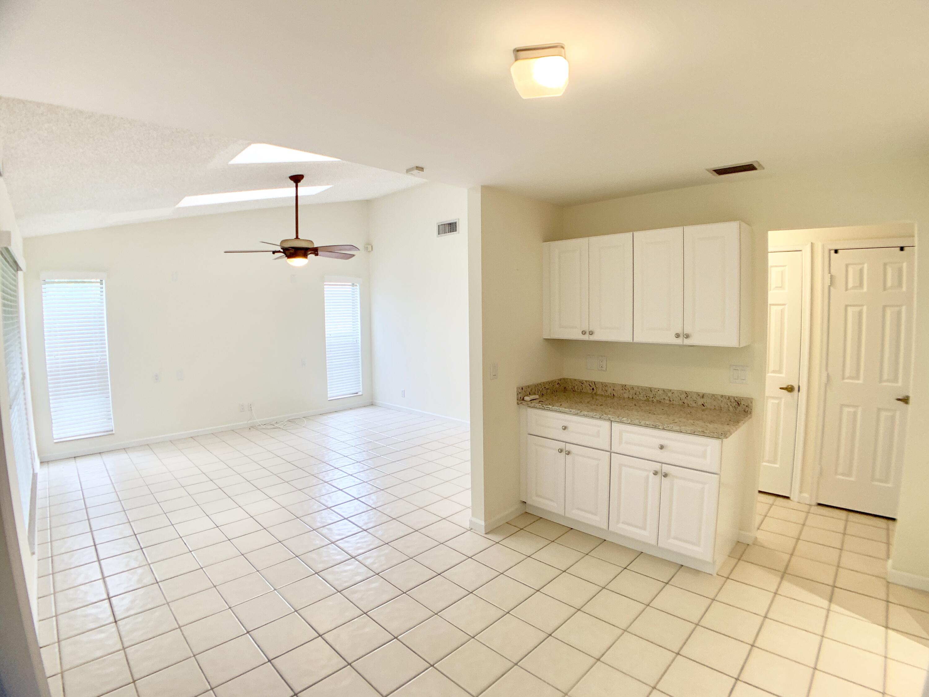 1242 Raintree Lane Wellington, FL 33414 - Photo 19 of 36 Kitchen/Family