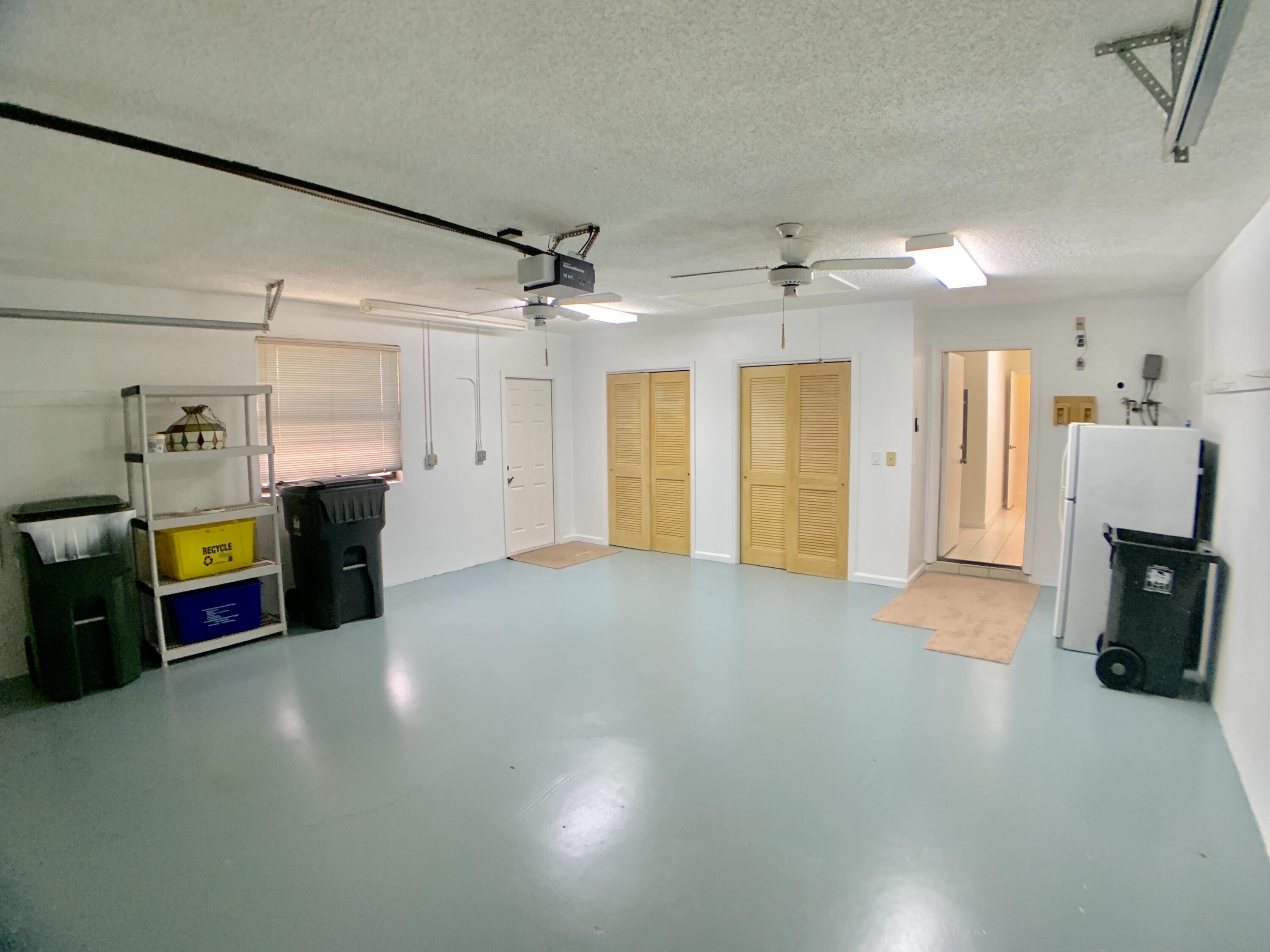 1242 Raintree Lane Wellington, FL 33414 - Photo 31 of 36 Garage