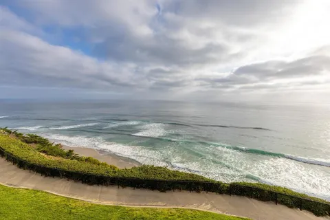 a view of an ocean from a balcony