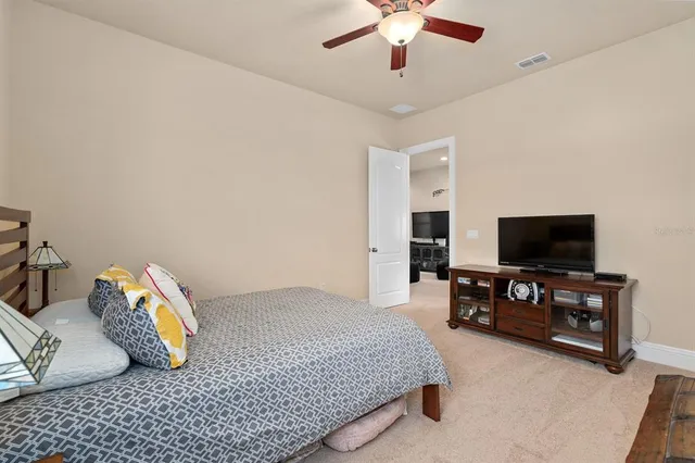 a backyard of a house with yard and outdoor seating