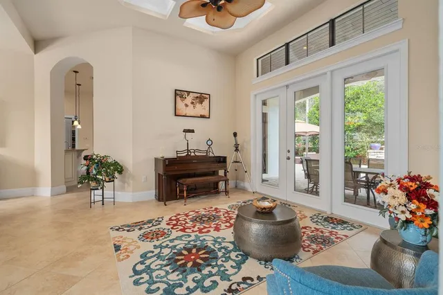a living room with furniture and a rug