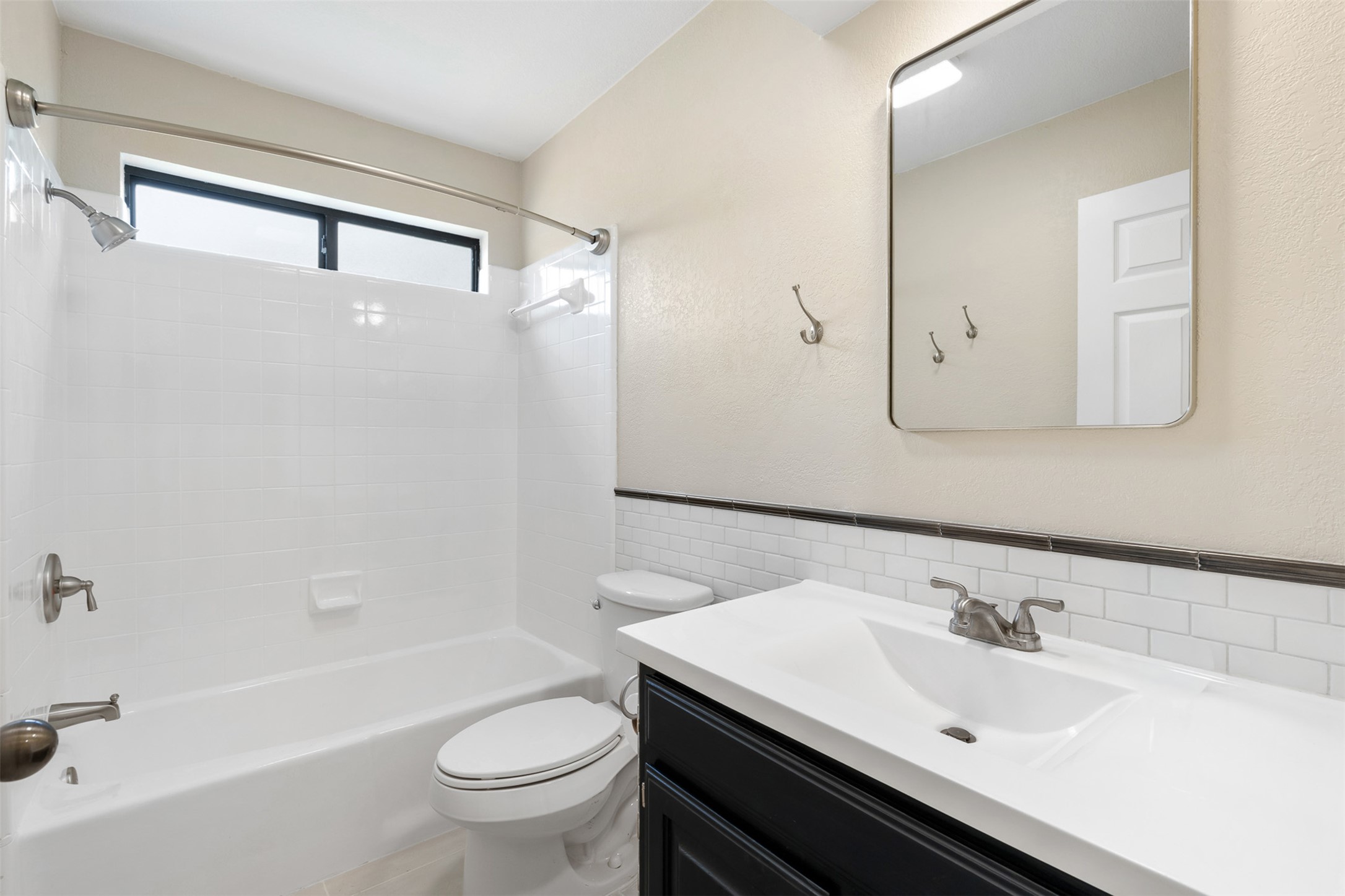 3203 Freemont Street Round Rock, TX 78681 - Photo 18 of 33 a bathroom with a sink and a mirror