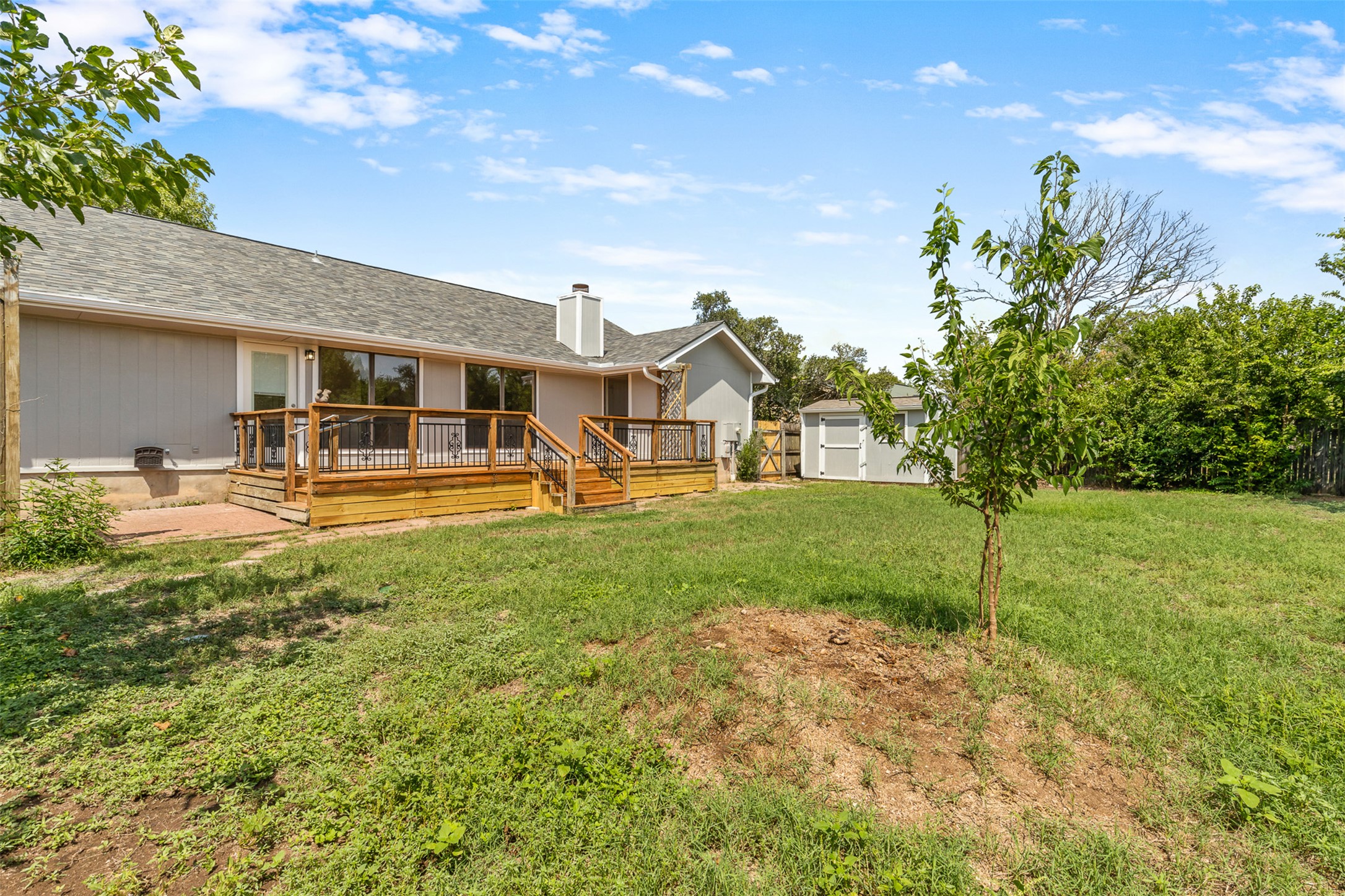 3203 Freemont Street Round Rock, TX 78681 - Photo 23 of 33 a front view of a house with a yard