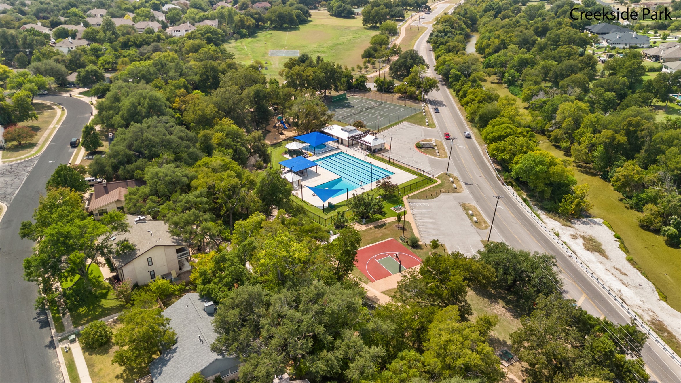 3203 Freemont Street Round Rock, TX 78681 - Photo 26 of 33 an aerial view of a house with a yard and lake view