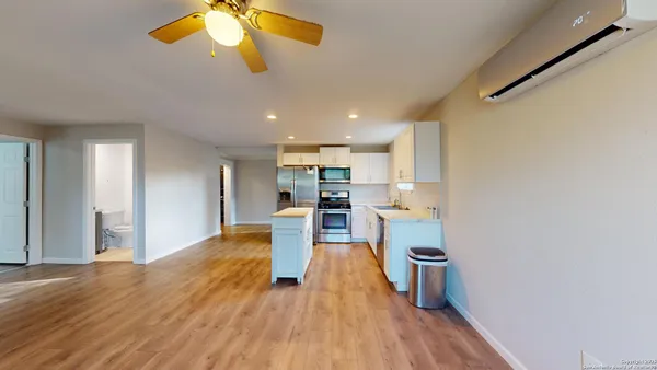 a view of kitchen with wooden floor