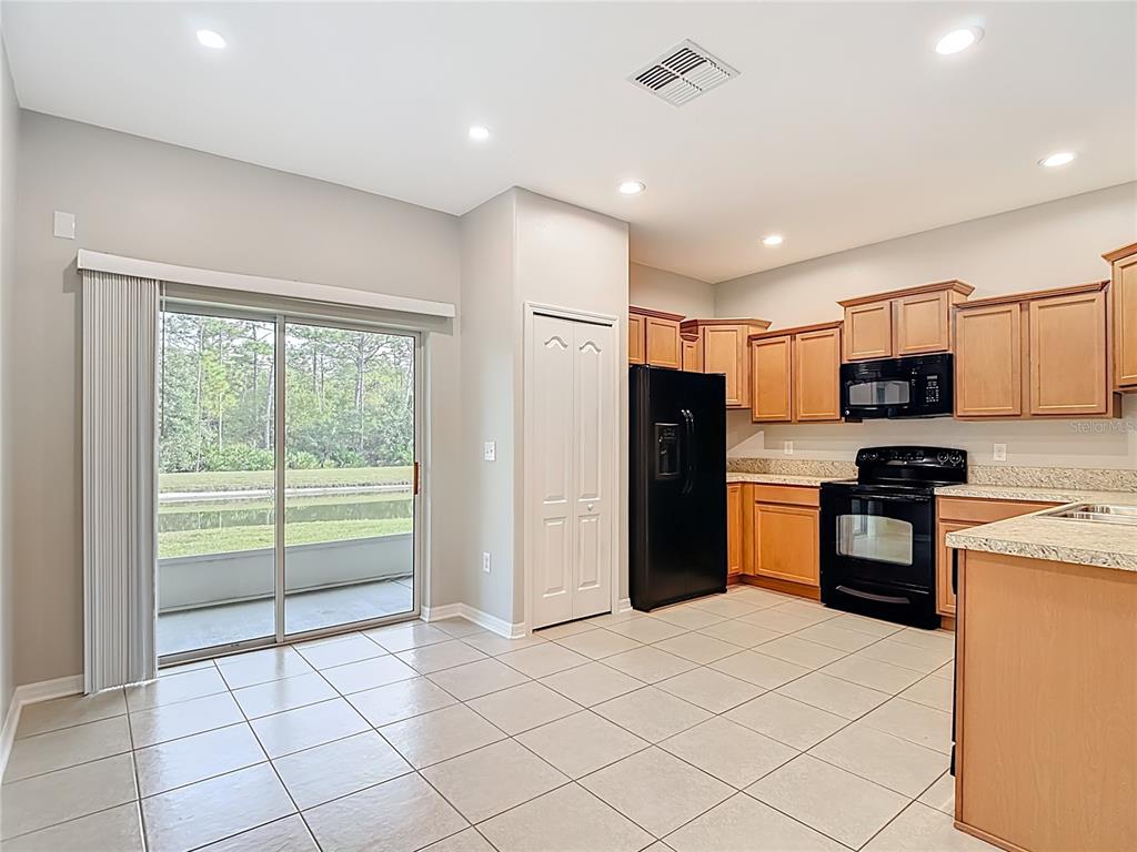 20451 Berrywood Lane Tampa, FL 33647 - Photo 11 of 57 a kitchen with stainless steel appliances a refrigerator sink and microwave