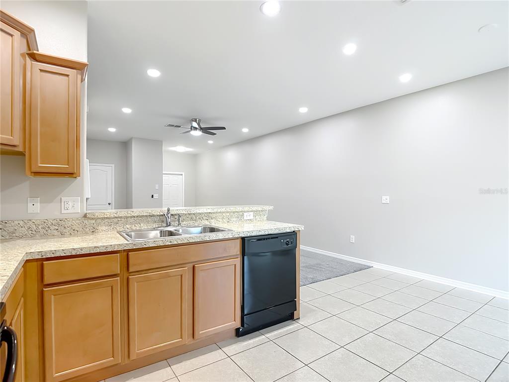 20451 Berrywood Lane Tampa, FL 33647 - Photo 16 of 57 a bathroom with a granite countertop sink and a mirror