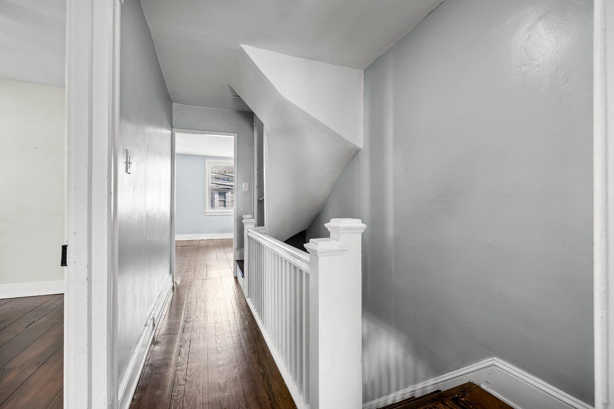 36 Brainerd Street Mount Holly, NJ 08060 - Photo 12 of 28 a view of a hallway with wooden floor