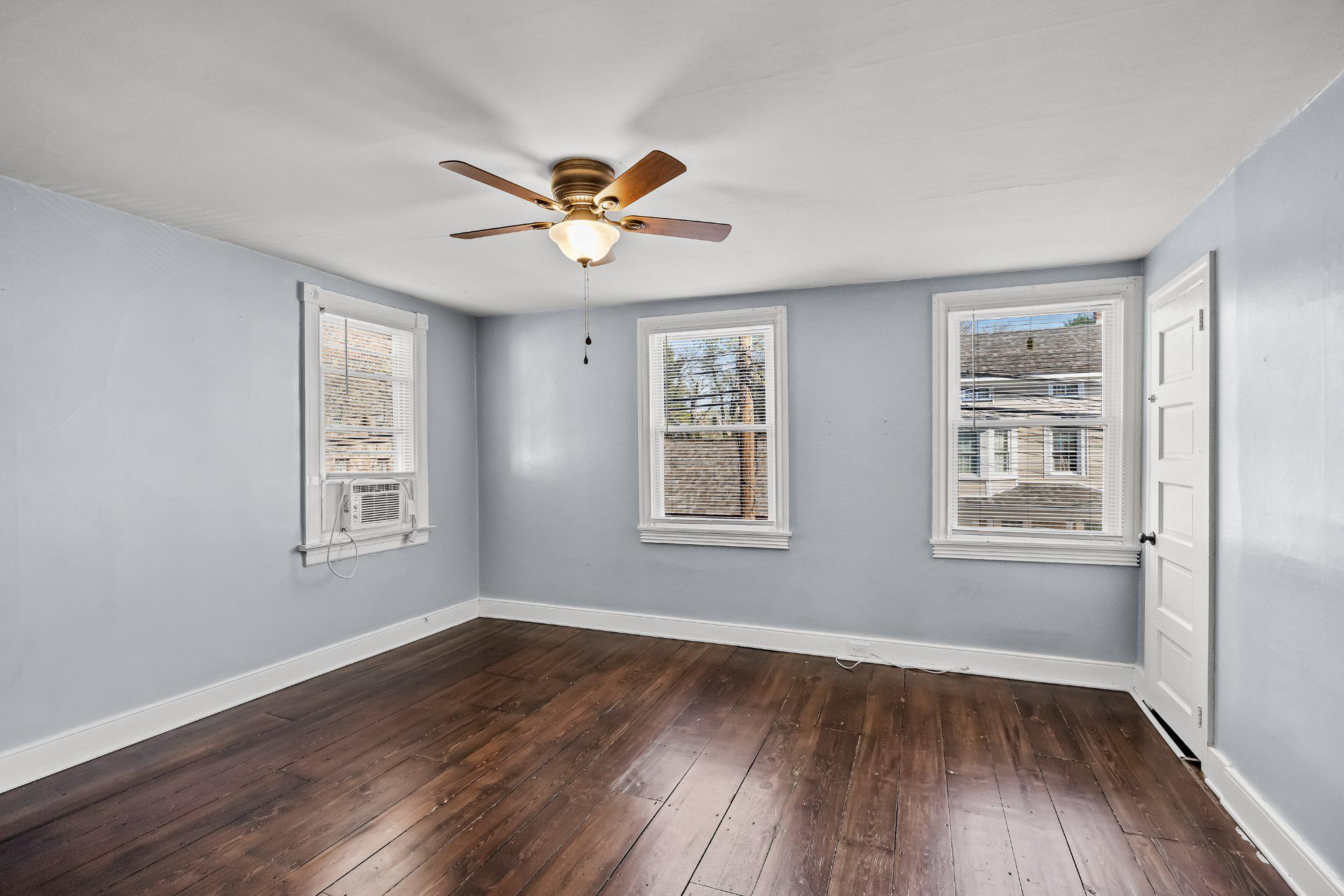 36 Brainerd Street Mount Holly, NJ 08060 - Photo 13 of 28 a view of empty room with wooden floor and fan