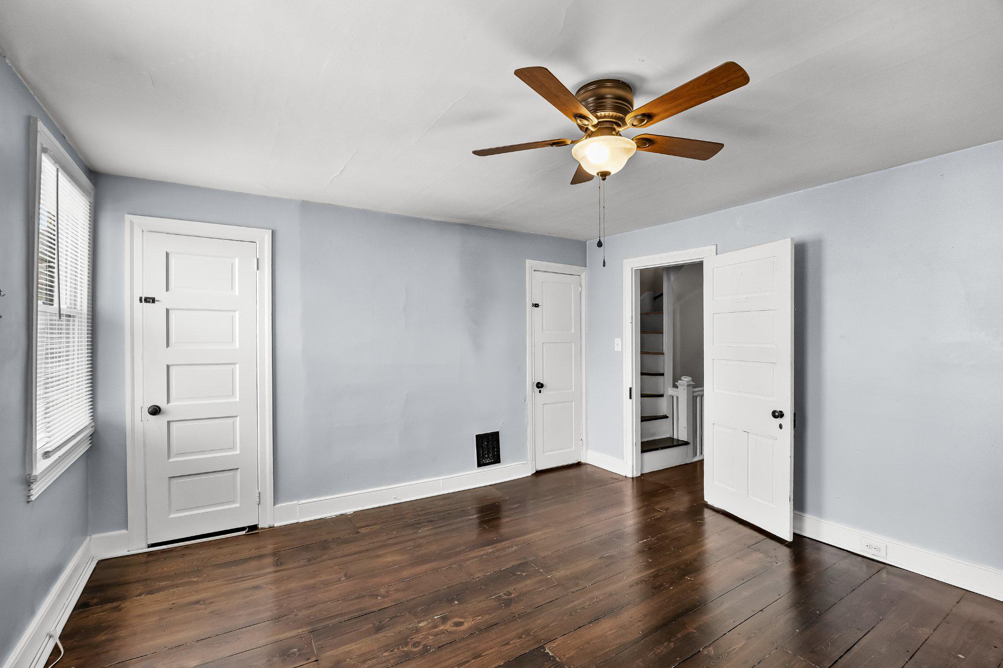 36 Brainerd Street Mount Holly, NJ 08060 - Photo 14 of 28 a view of a livingroom with a ceiling fan and wooden floor